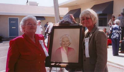 NAMI San Diego Founder and former President, Helen Teisher (left), celebrates the organization’s purchase of our office buildings and Open House in 2002 with Karenlee Ross and the unveiling of her portrait.